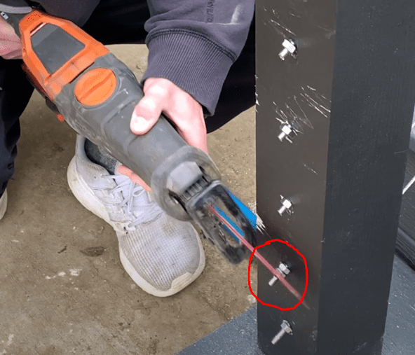 Cutting the excess bolt length from the cable railing hardware