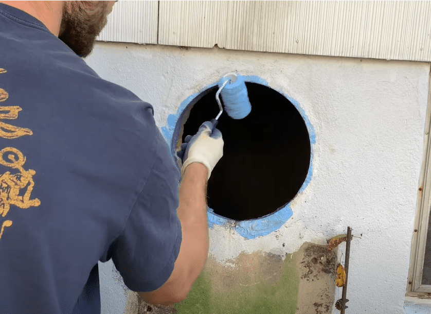 Apply weld-crete bonding agent to the hole in the foundation