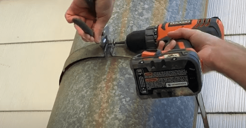 Remove Metal Straps by Unscrewing the Screws or by cutting the Straps with Metal Snippers 