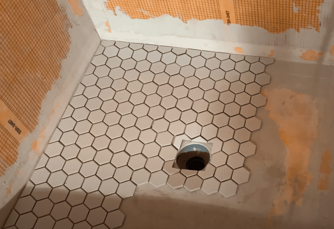 How To Tile A Shower Pan Kerdi, How To Tile Around A Drain In Shower