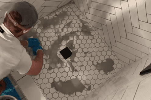 Apply Grout to Your Shower Pan Tile Installation 