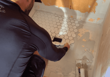 Install tiles around the Shower Drain 