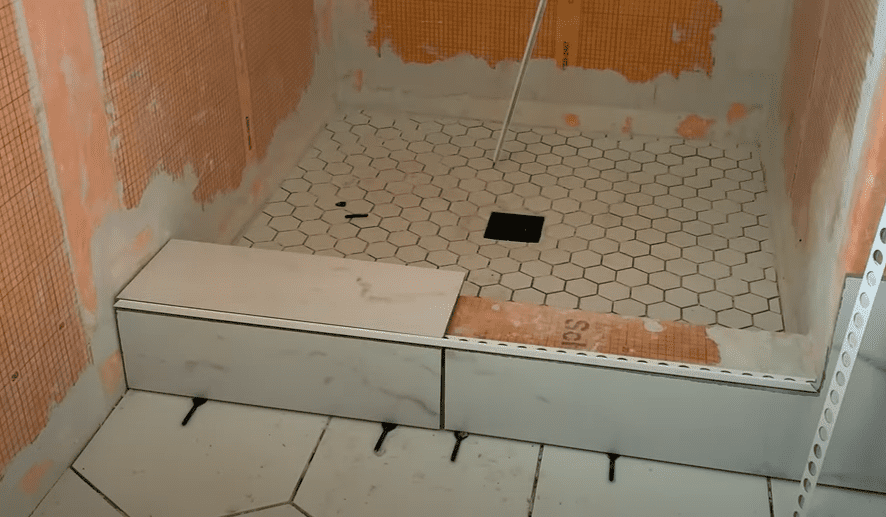How to build a shower curb on concrete floor