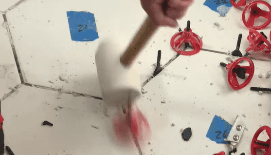 Remove tile spacers and leveling system with a firm strike of a rubber mallet