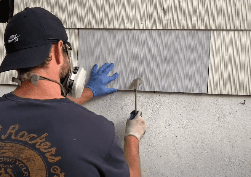 Use siding nails to secure the replacement fiber cement siding shingles to the house
