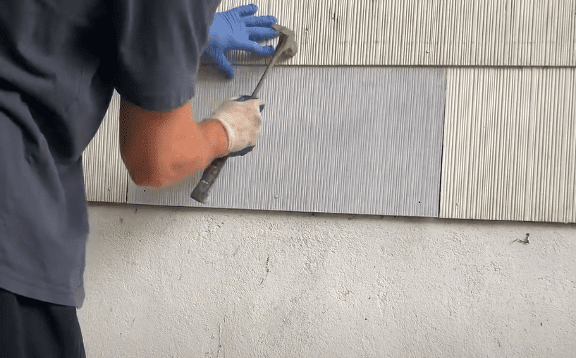 Ensure that no surrounding nails became loose  during the installation of the replacement fiber cement siding shingle.  