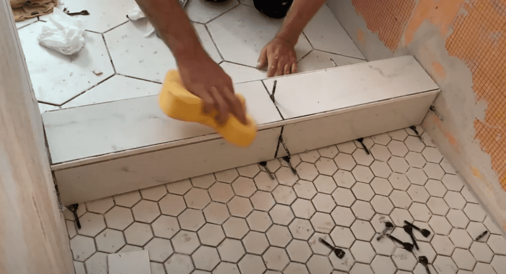 Remove any excess thinset mortar using a wet sponge