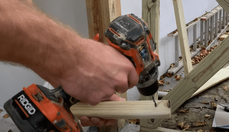 Pre drill your baluster screw holes at a 45 degree angle