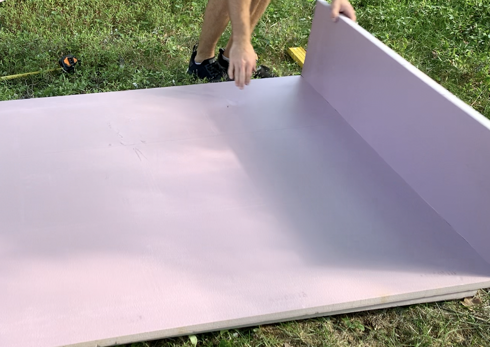 Snap the rigid foam board insulation along the scored line