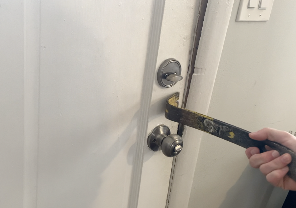Remove the Door Trim Casing Using a Prybar and Hammer