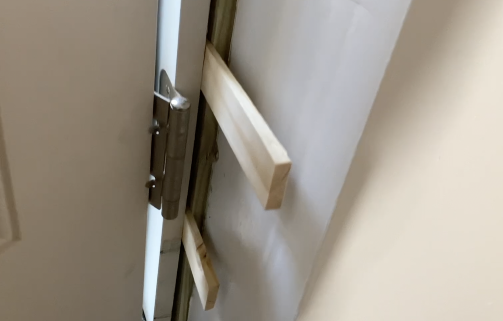 Install Shims behind the door hinges