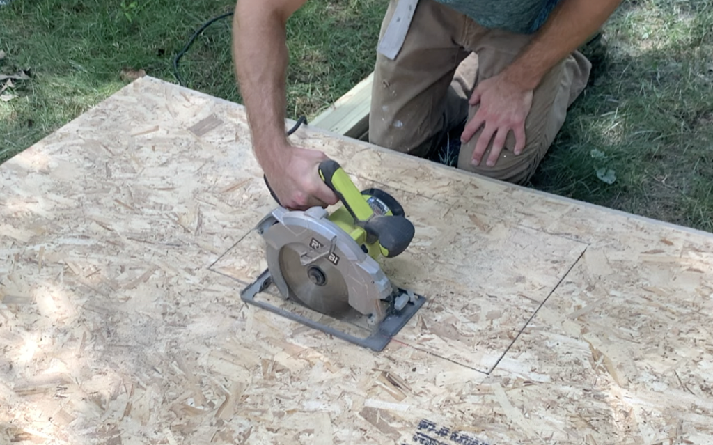 Cut out the Shed Window Rough Opening in the Siding with a Circular Saw