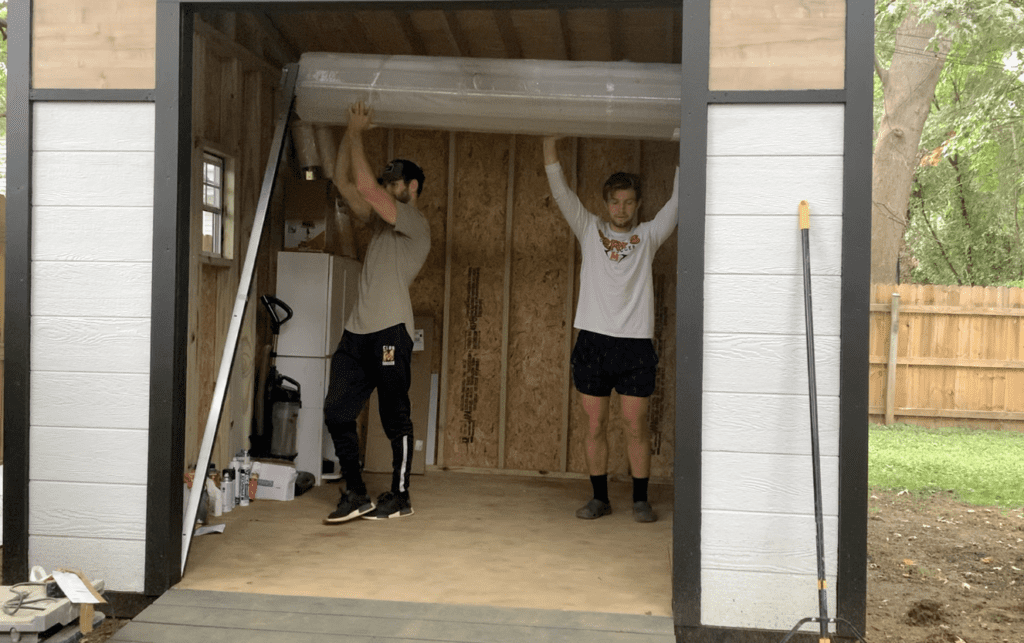 Lift the Roll Up Door into place