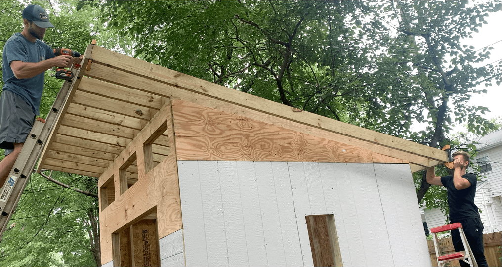 Use clamps as needed to temporarily hold the overhung rafter in place while you fasten the rafter to the fascia board 
