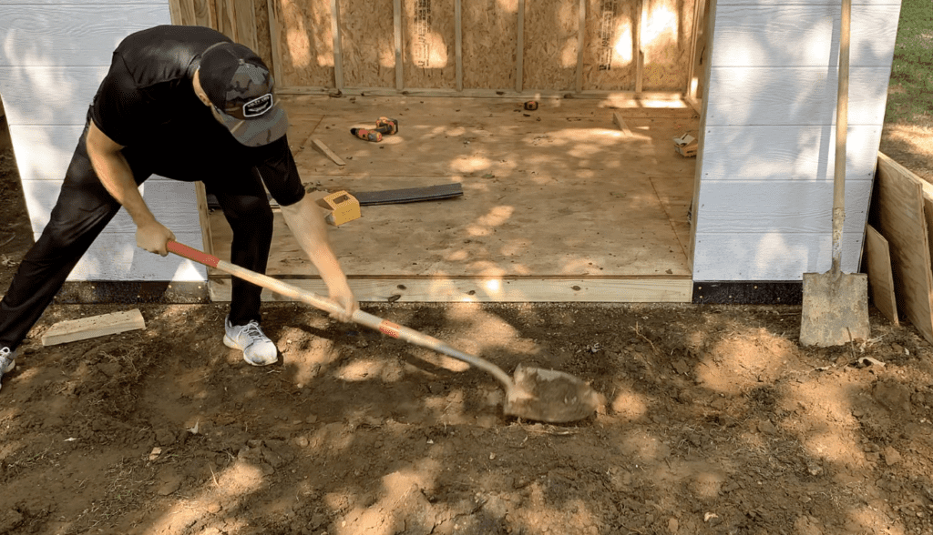 Excavate as necessary to get the shed ramp perfectly level