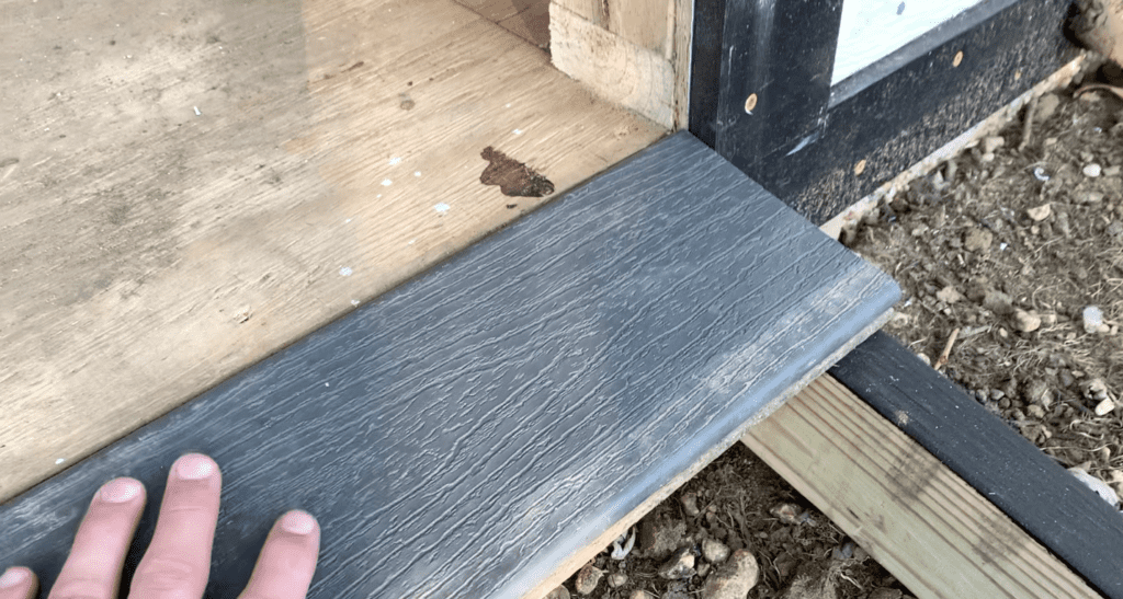 Install shed ramp ledger board based on the decking board thickness (a flush transition is desired)