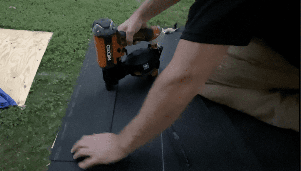 Nail the starter strip to the roof plywood decking using a roofing nailer as shown