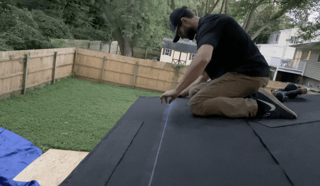 Snap a chalk line for the back line of the first course of asphalt shed shingles