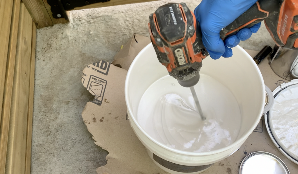 Mix Part A and Part B of the epoxy system together with a drill mixer. 