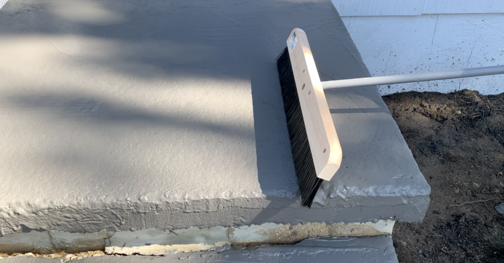 Apply a broom finish to the concrete