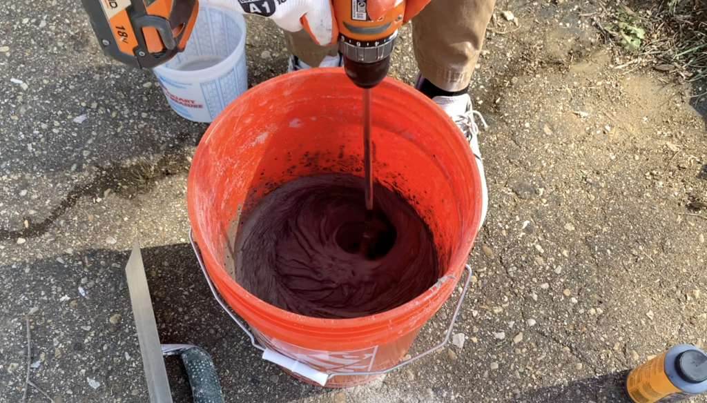 Mix the Concrete in the Bucket Using a Drill and Mixer Attachment