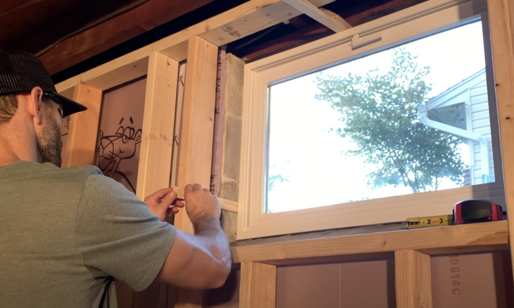 Install shims and use them to make sure the window is perfectly level