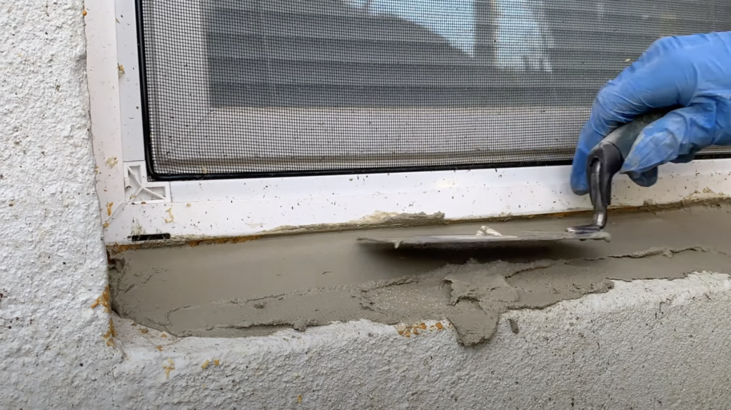 Make concrete repairs around the window - if needed