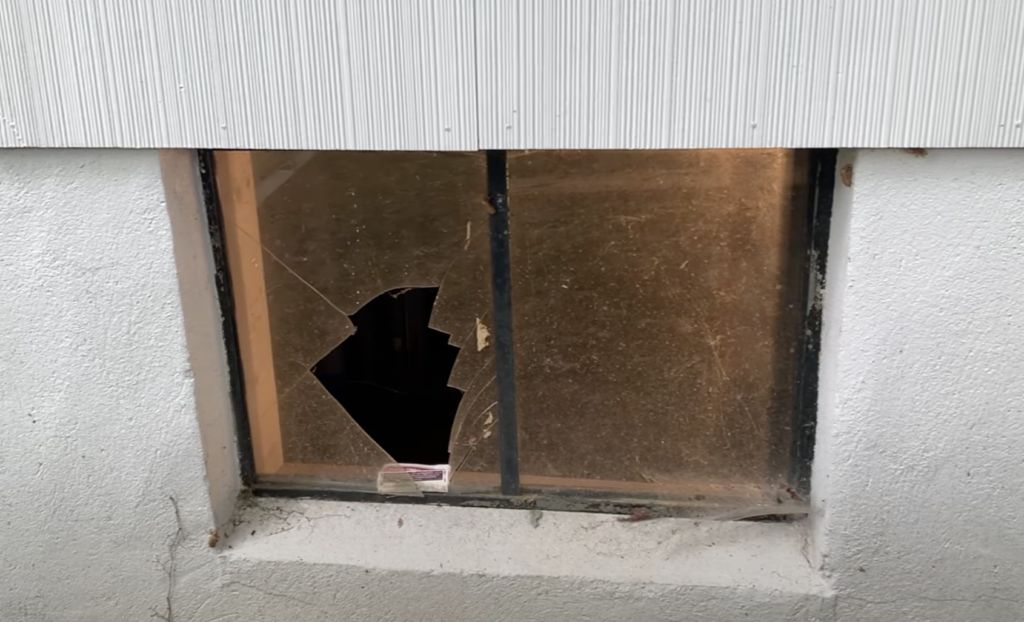 An example of an old, broken Basement window in need of replacement 