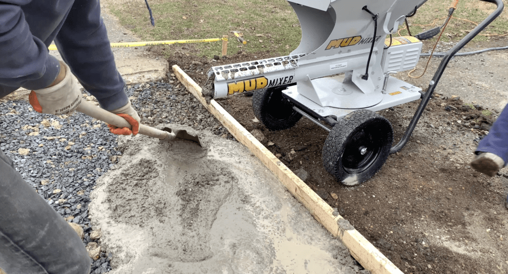Apply concrete to the sidewalk area