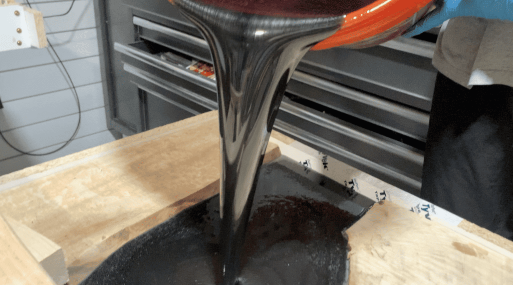 Pour the epoxy in the center of the epoxy river table