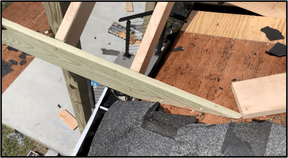 Attach the fascia board to the roof decking using a framing nailer